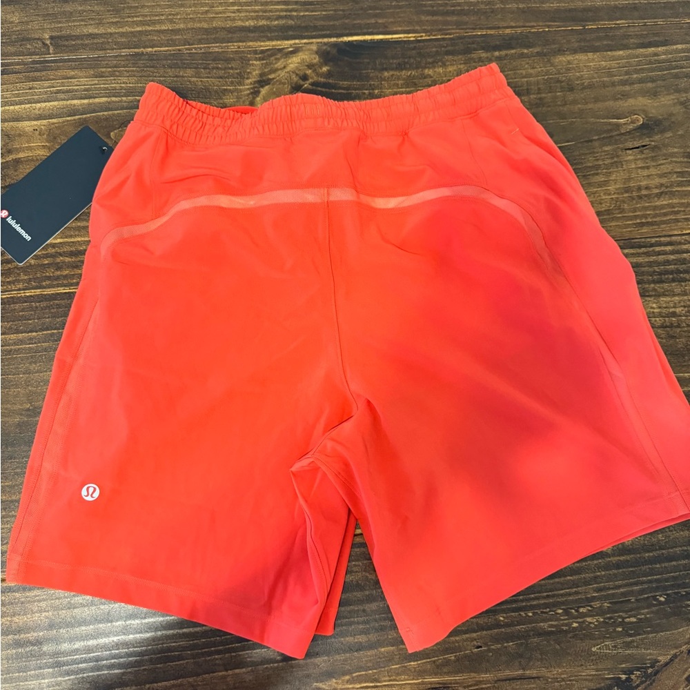Luluemon men’s pace breaker size medium red shorts